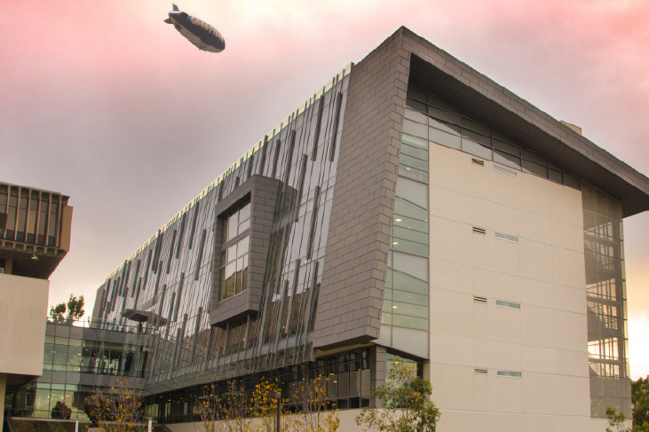 photography sample - csudh library with Goodyear blimp in sky in background