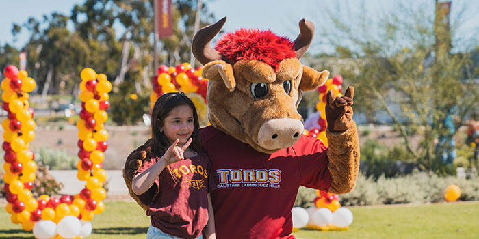 Teddy Toro with a child