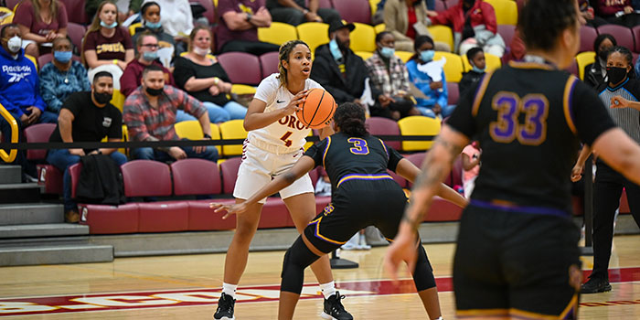 Women's basketball player passing the basketball