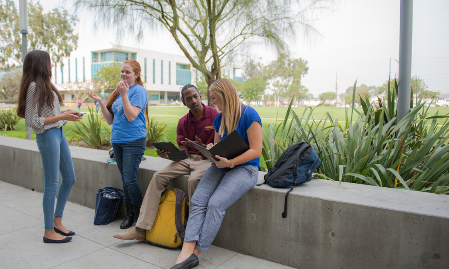 Students in front of Loker Student Union chatting