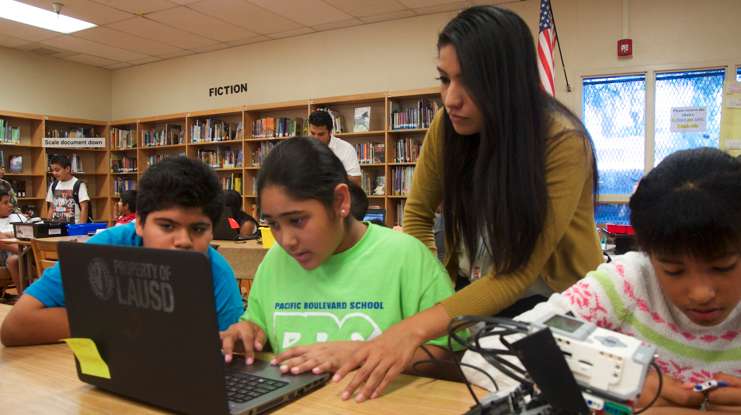 Teacher with students