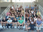 6 rows of students sitting on stairs