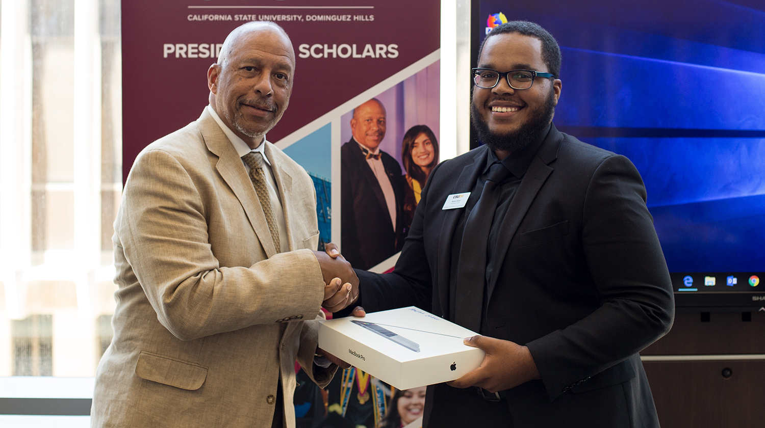 Student with president and laptop