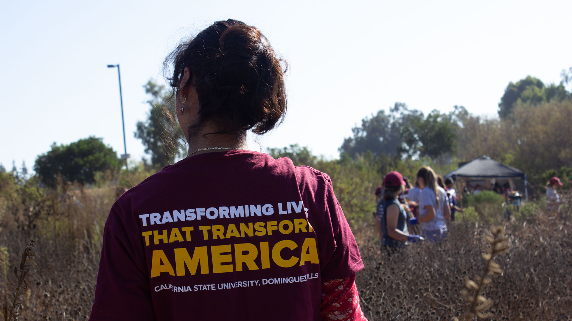 Student with Transforming Living Shirt
