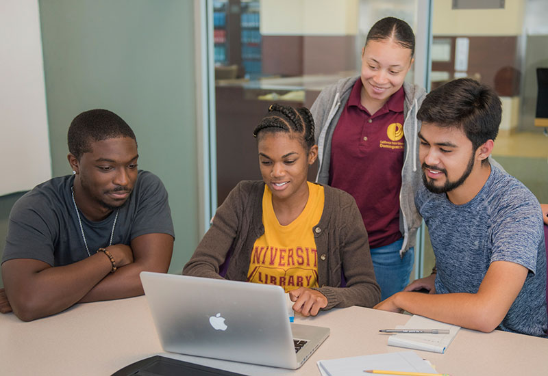 Students viewing a webpage on a computer