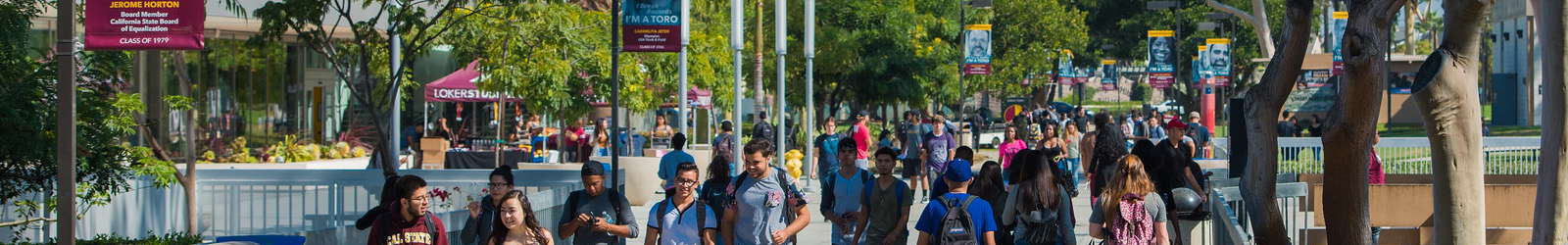 Banner - students at east walkway